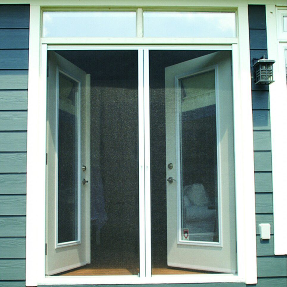 White-framed double windows open outward on a blue house wall.